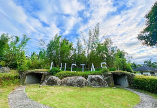 LUCIA'S sign surrounded by landscaped gardens for celebrations